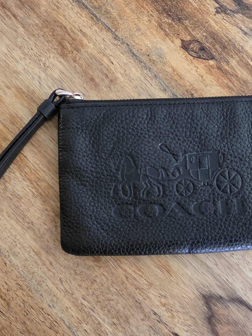 Coach Black Pebbled Leather Wristlet with Embossed Carriage